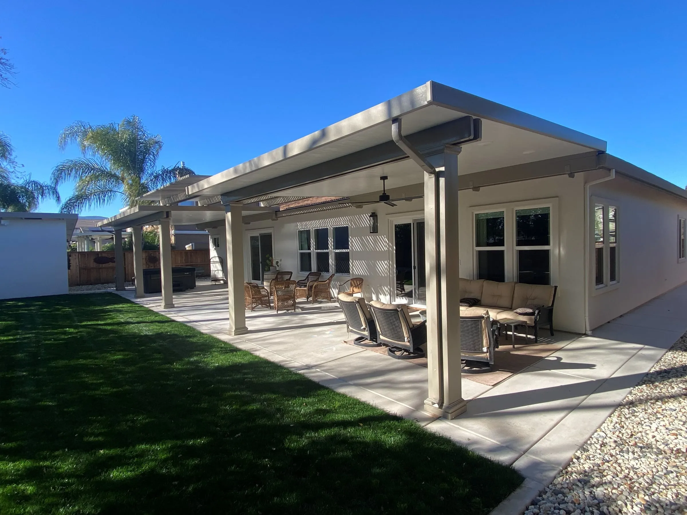Patio cover along the back of a single-story home