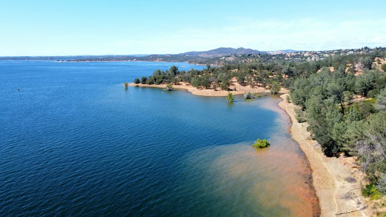 Folsom Lake shoreline and oak-covered hills near Rocklin