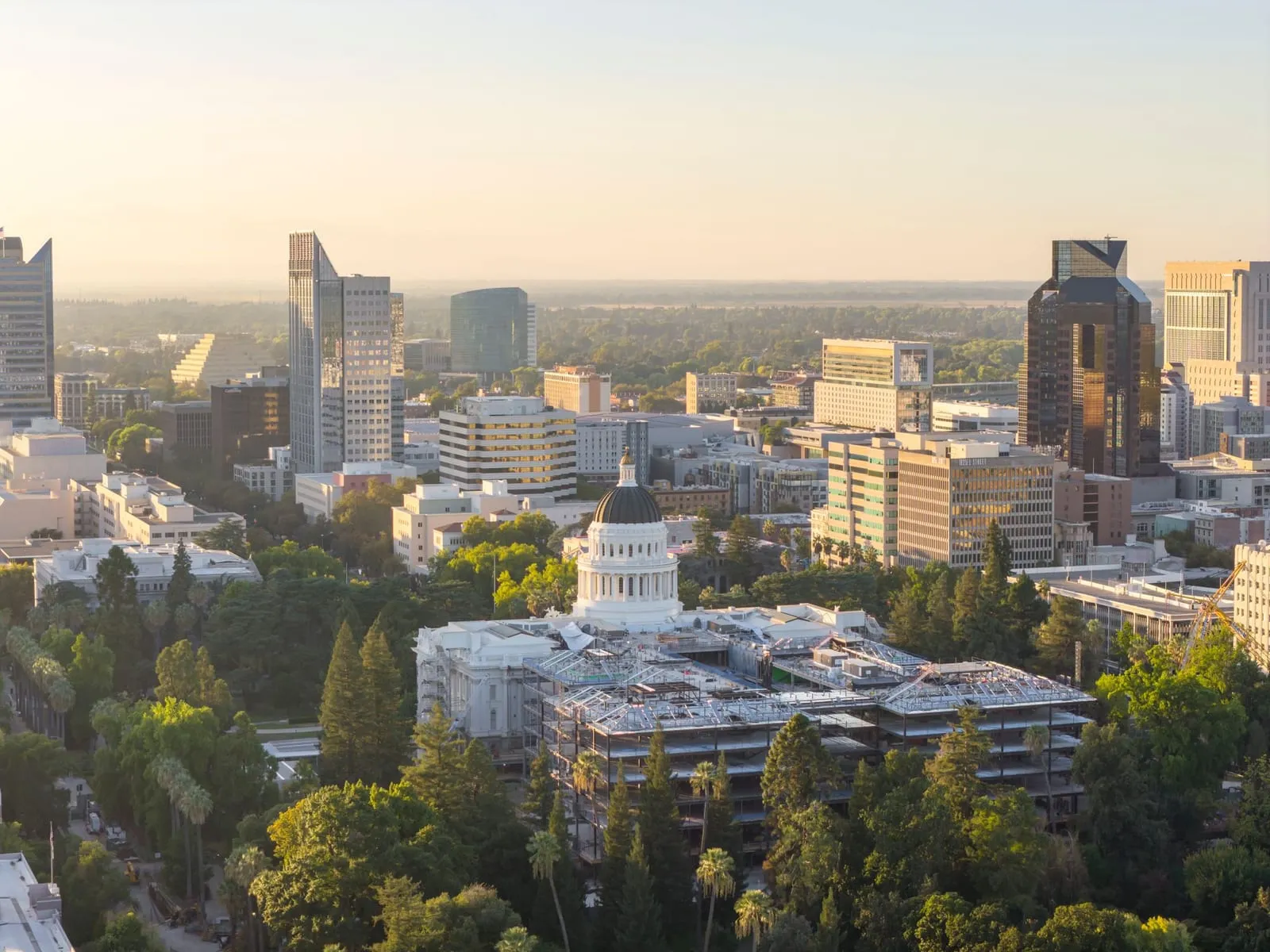 Downtown Sacramento skyline and the State Capitol dome at dusk