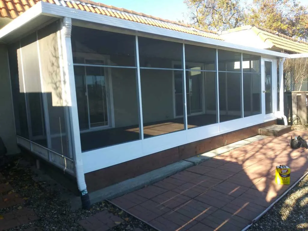 Screen room with brick patio at a mobile home