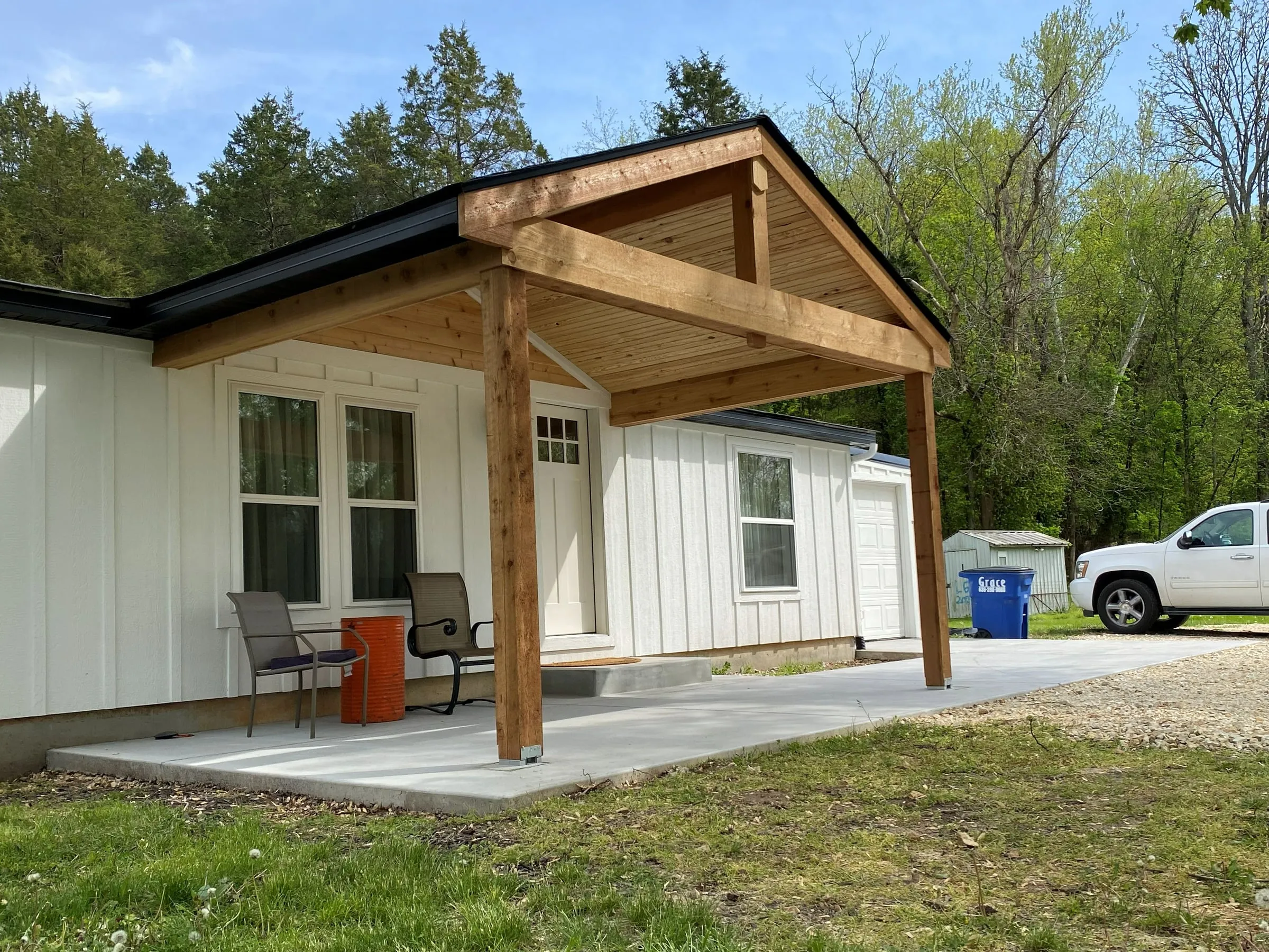 Custom wood gable patio cover over a new concrete patio